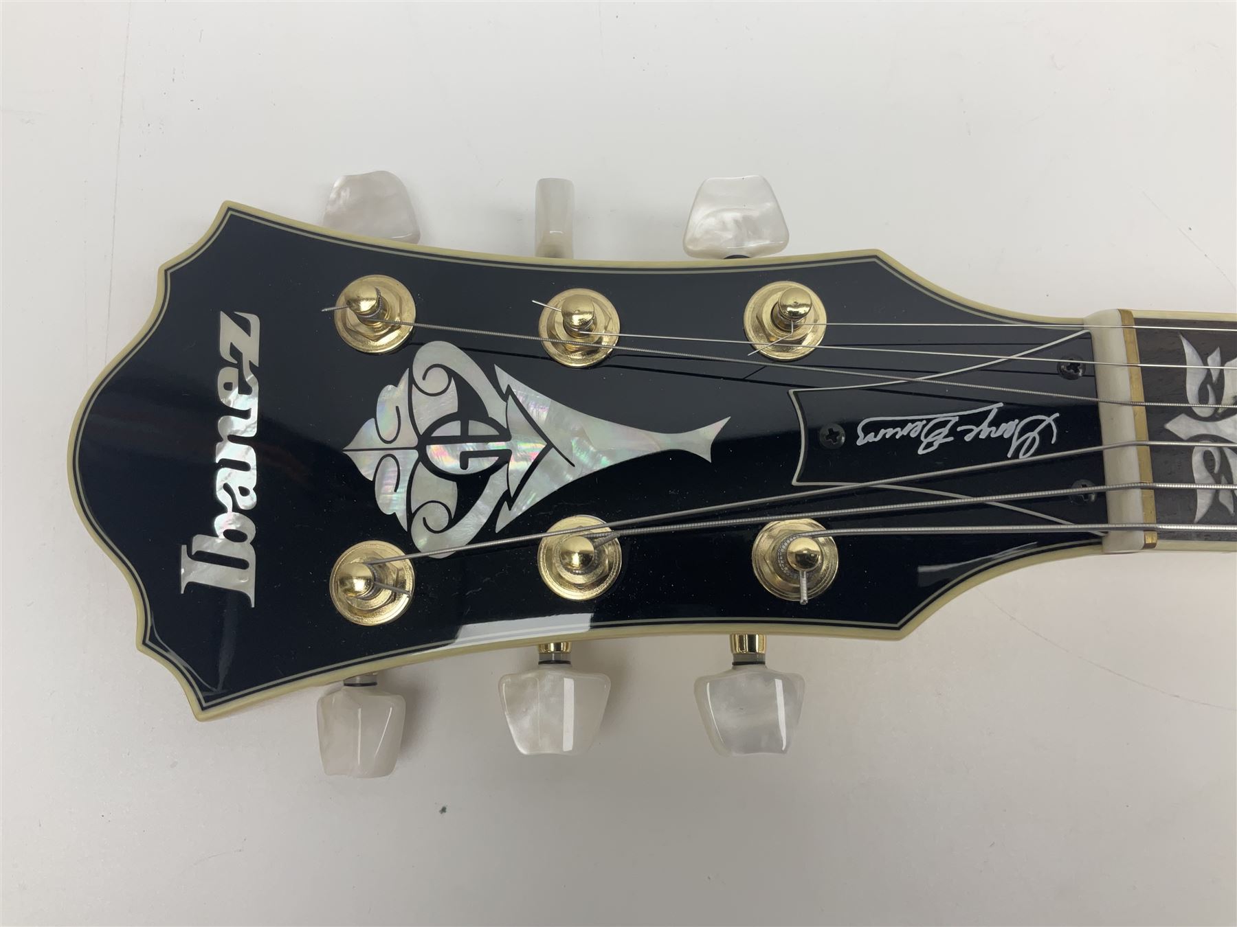 Ibanez George Benson 40th Anniversary arch top semi-acoustic guitar with floating pick-ups and mother-of-pearl inlay; model no.GB40THII serial no.S16120480; L104.5cm; in Ibanez hard carrying case with manual