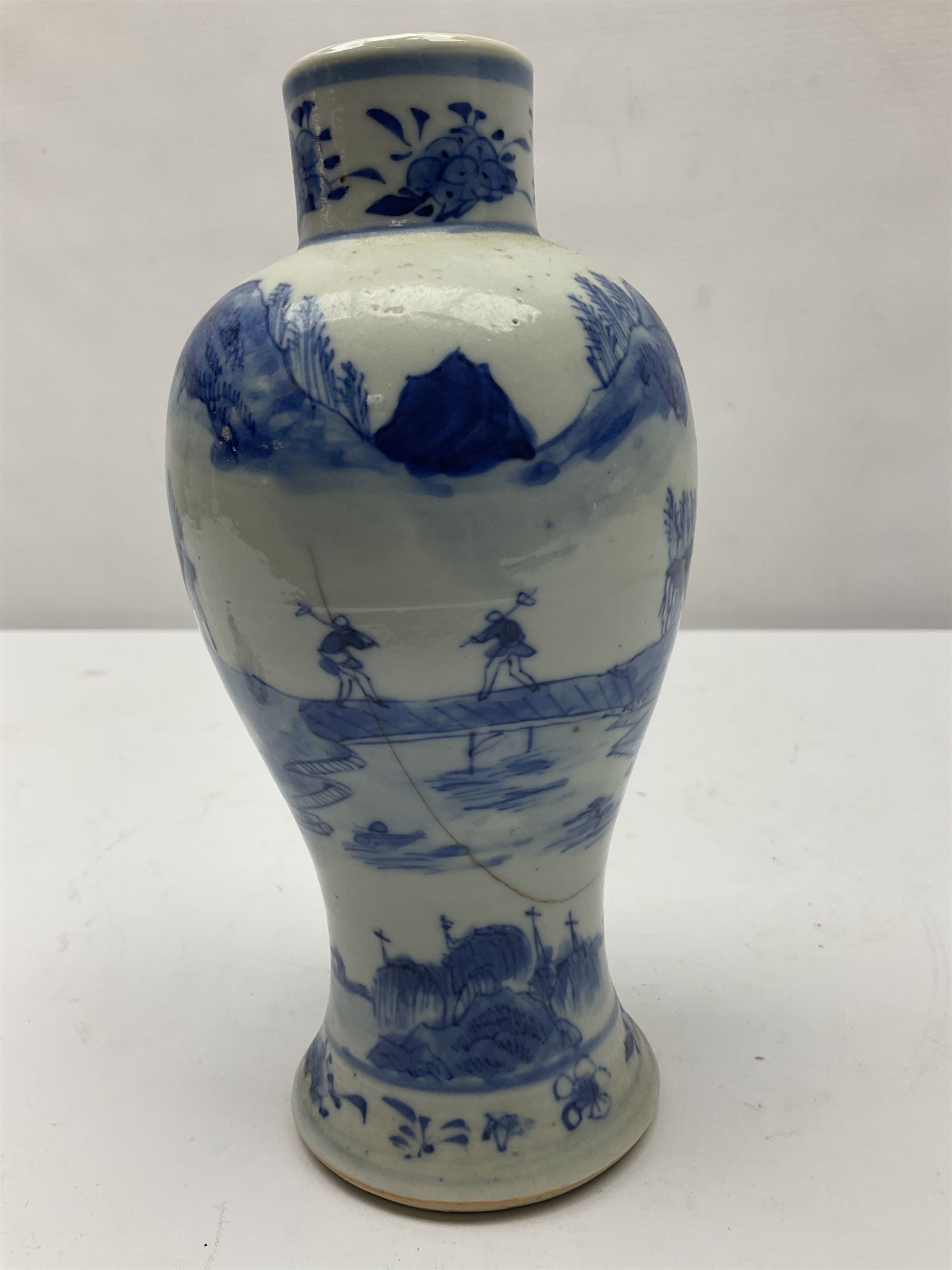 19th century Chinese Kangxi style blue and white jar and cover, decorated with figural and landscape scenes, the domed cover with foo dog finial, with four character marks beneath, H22cm