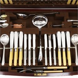 Canteen of plated Elkington Monarchy cutlery in mahogany table stand on cabriole legs W67cm