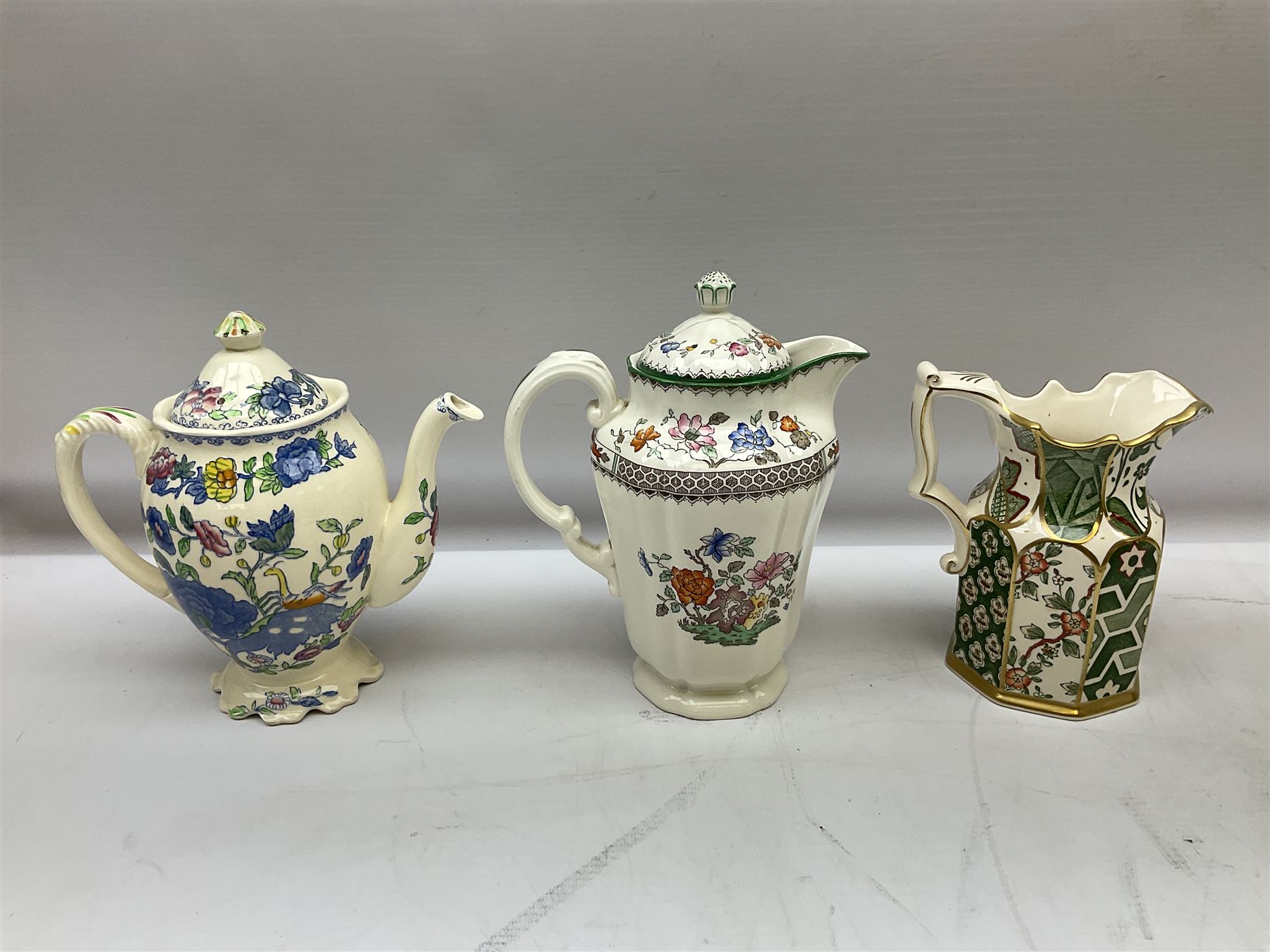 Group of ceramics to include Art Deco examples, Arthur Wood twin handled vase decorated in the Garden Wall pattern, Art Deco style Coalport twin handled lidded sucrier and saucer, Mason's Applique jug (scratch through mark), Royal Doulton Minden bowl and jug, Copeland Spode Royal Jasmine jug, Crown Devon, etc