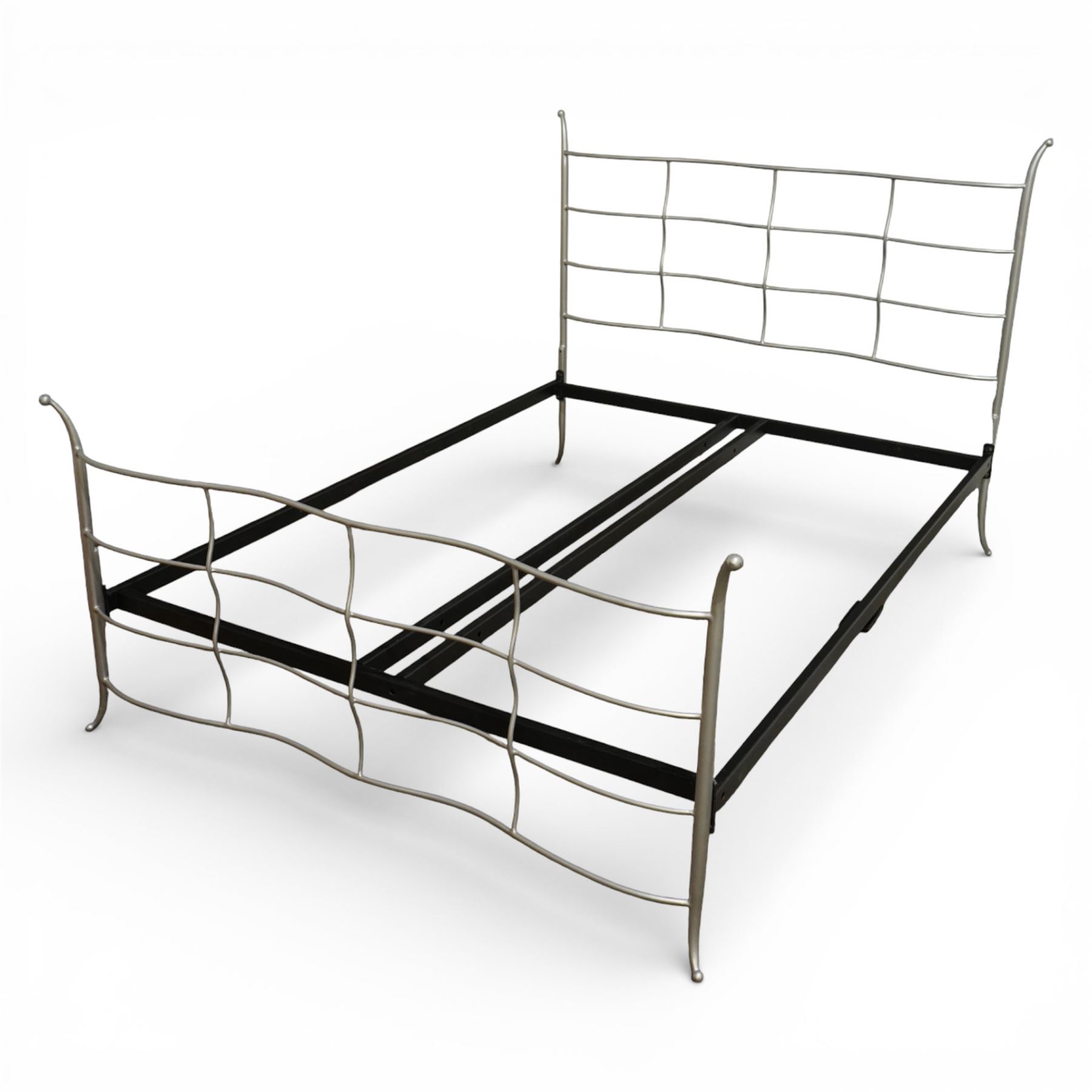 And So To Bed - ‘Verdi’ king size bed, with metal headboard and footboard formed with undulating silver painted metal horizontal bars and shaped uprights, on a black metal bed frame,