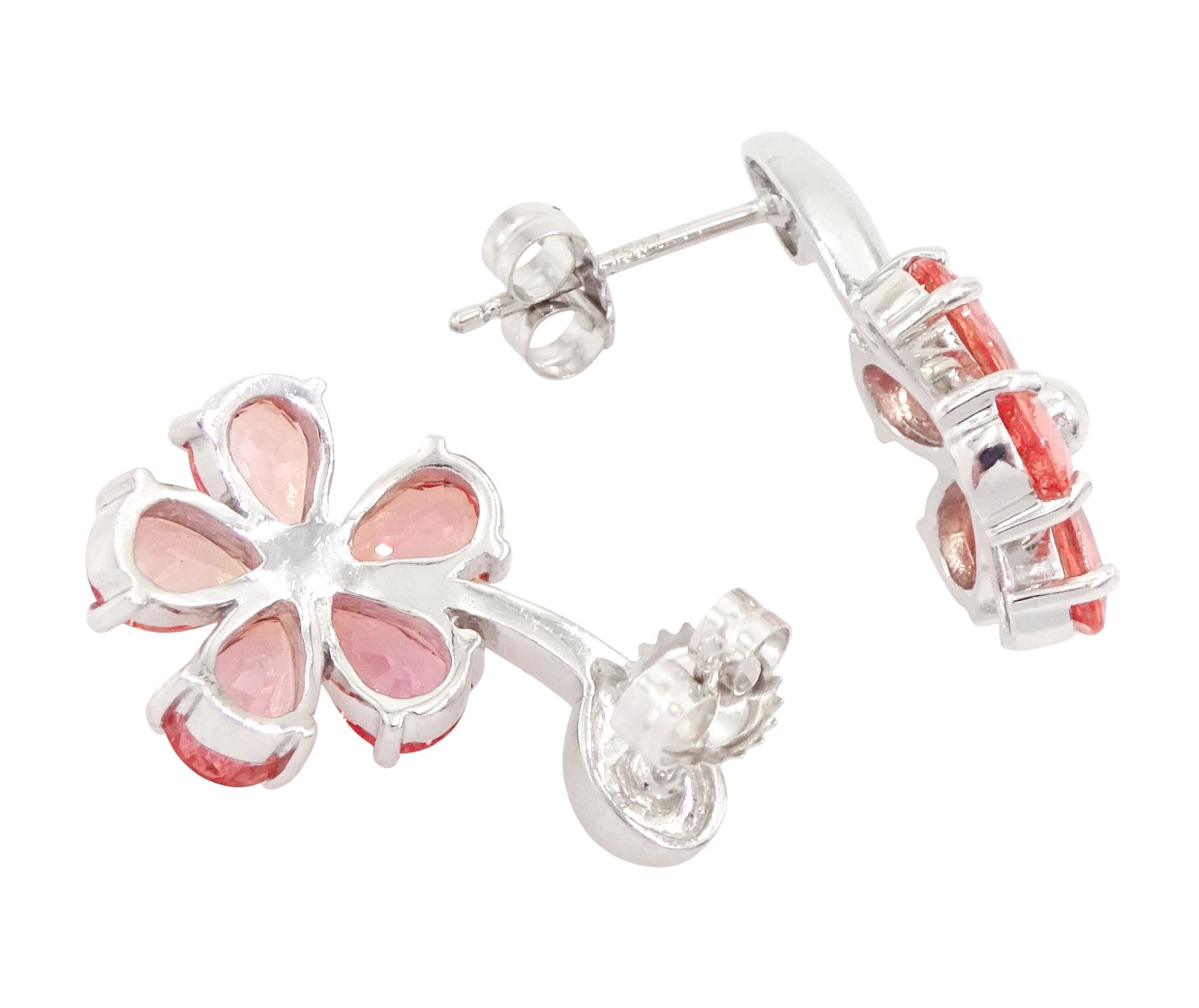 Pair of 18ct white gold padparadscha sapphire flower head stud earrings, each stem suspending a pendant flower head, set with five pear cut sapphires, Birmingham 2006, total sapphire weight approx 3.95 carat