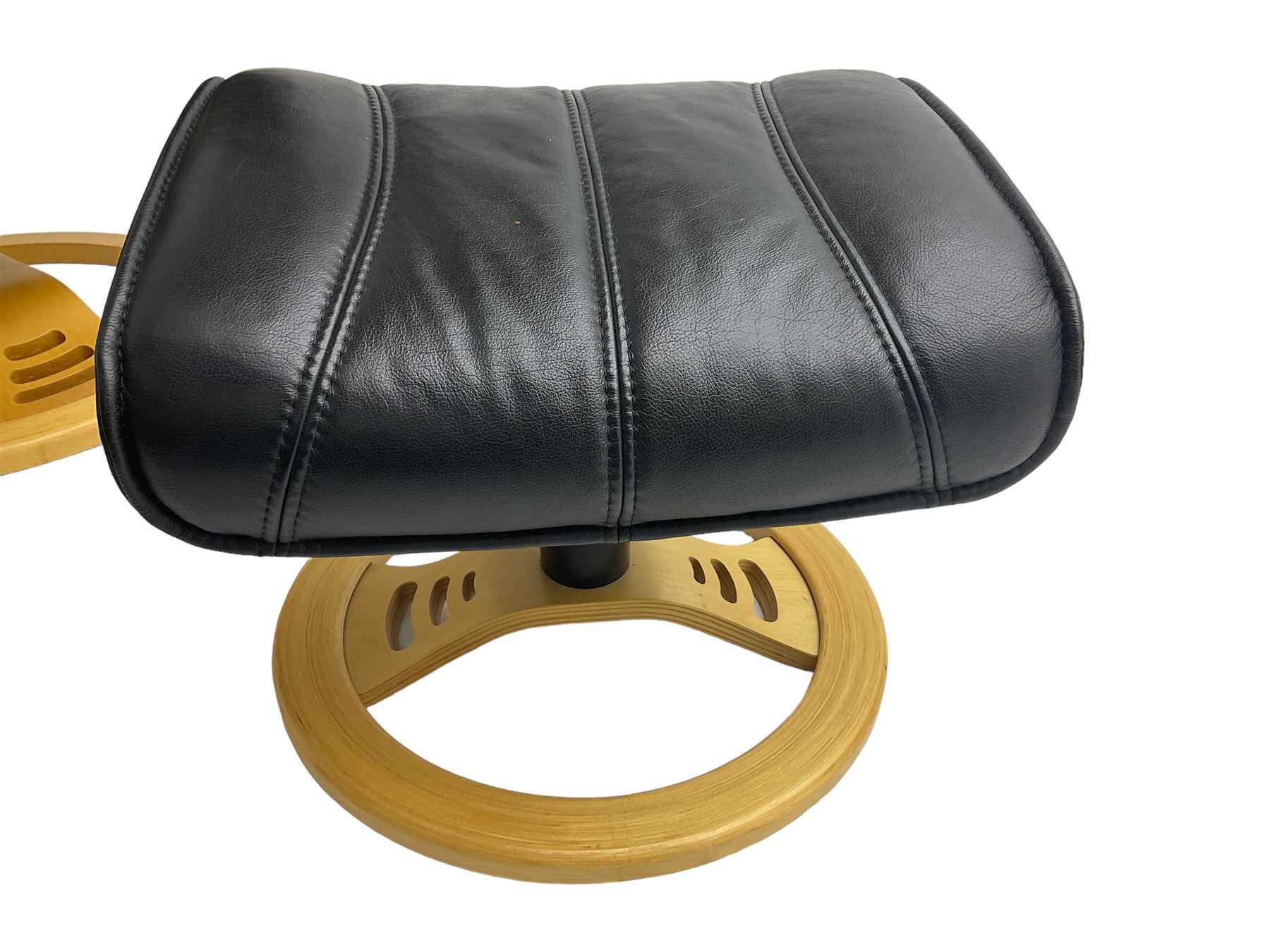 Anderssons of Sweden - mid-20th century design swivel armchair, upholstered black leather, raised on beech U-frame supports with circular base, together with matching footstool 