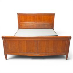 And So To Bed - cherrywood 6' super king 'Nathalie' bed, the panelled headboard and footboard with cylindrical rolled rails, decorative brass mounts to the corners, on square supports with cream and black edged fabric covered base panels 