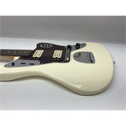 Mexican Fender Jaguar electric guitar with Humbucker pick-ups and tremolo arm, serial no.MX16741977, L101cm; in soft carrying case