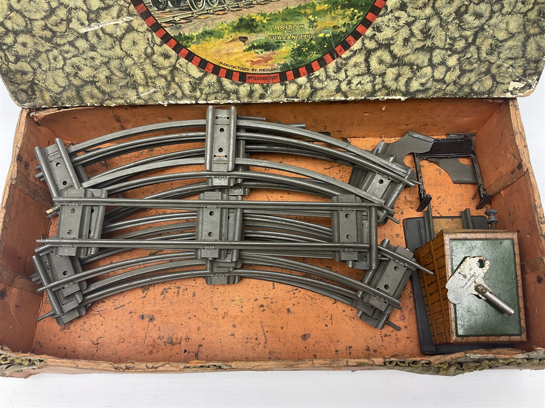 Hornby ‘0’ gauge - No. 0 Goods Set box containing clockwork LNER 0-4-0 locomotive with matching tender no.2710 in black and gold, originally from the No. 1 Goods Set; with NE open wagon, quantity of track, track clips, buffer and key 