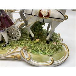 Capodimonte figure group of a horse drawn carriage with two horses pulling an open carriage with a male with dresden lace cuff and a female with full dresden lace skirt,  on a naturalistic base, H15.5cm