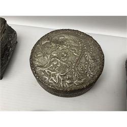 Brass sunfish ashtray, Chinese silver plated trinket box with mirror, bronzed matchbox cover and a collection of other Oriental bronzed embossed metal trays