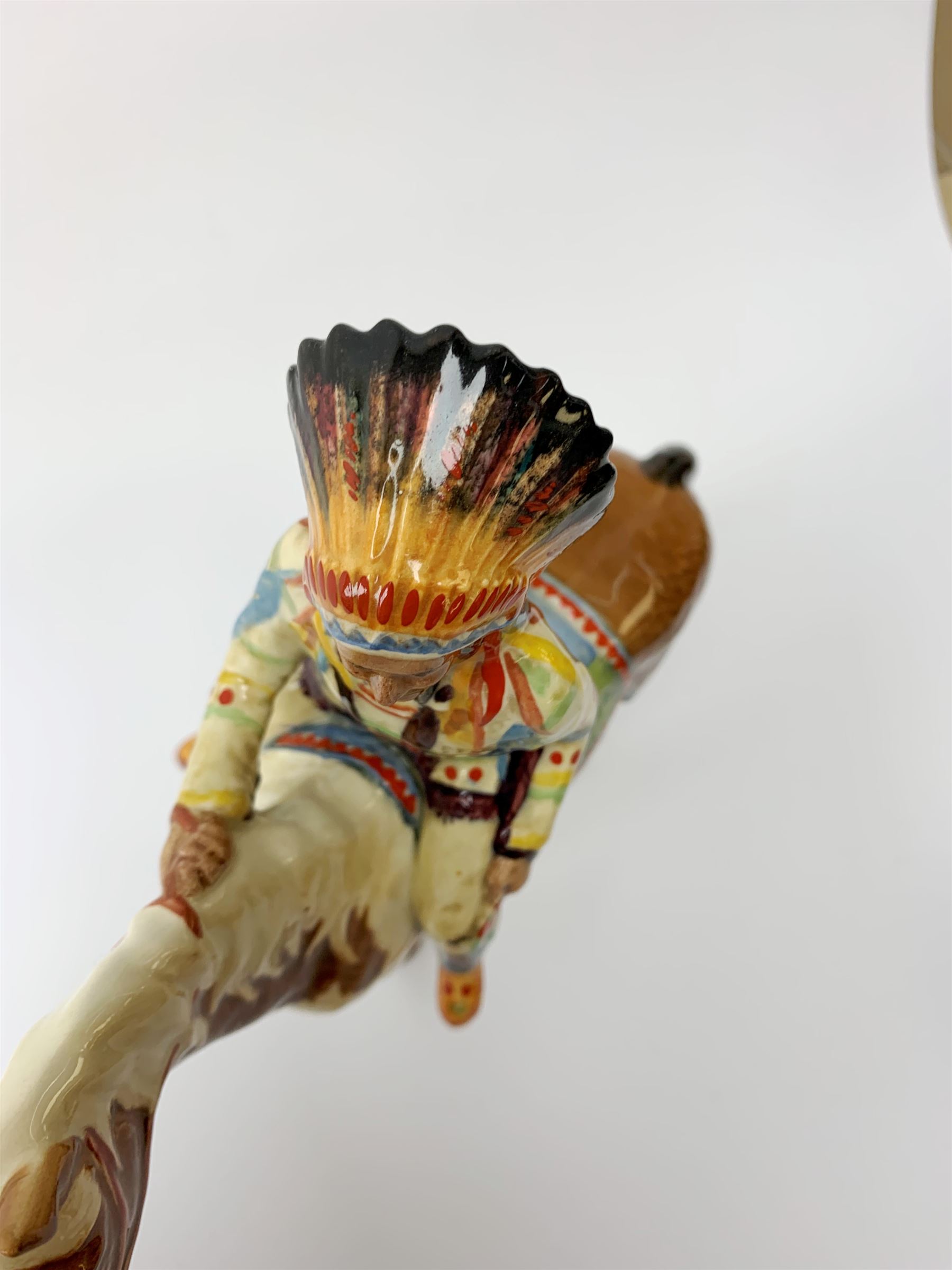 A Beswick Native American on horseback, with printed mark beneath, H21.5cm. 