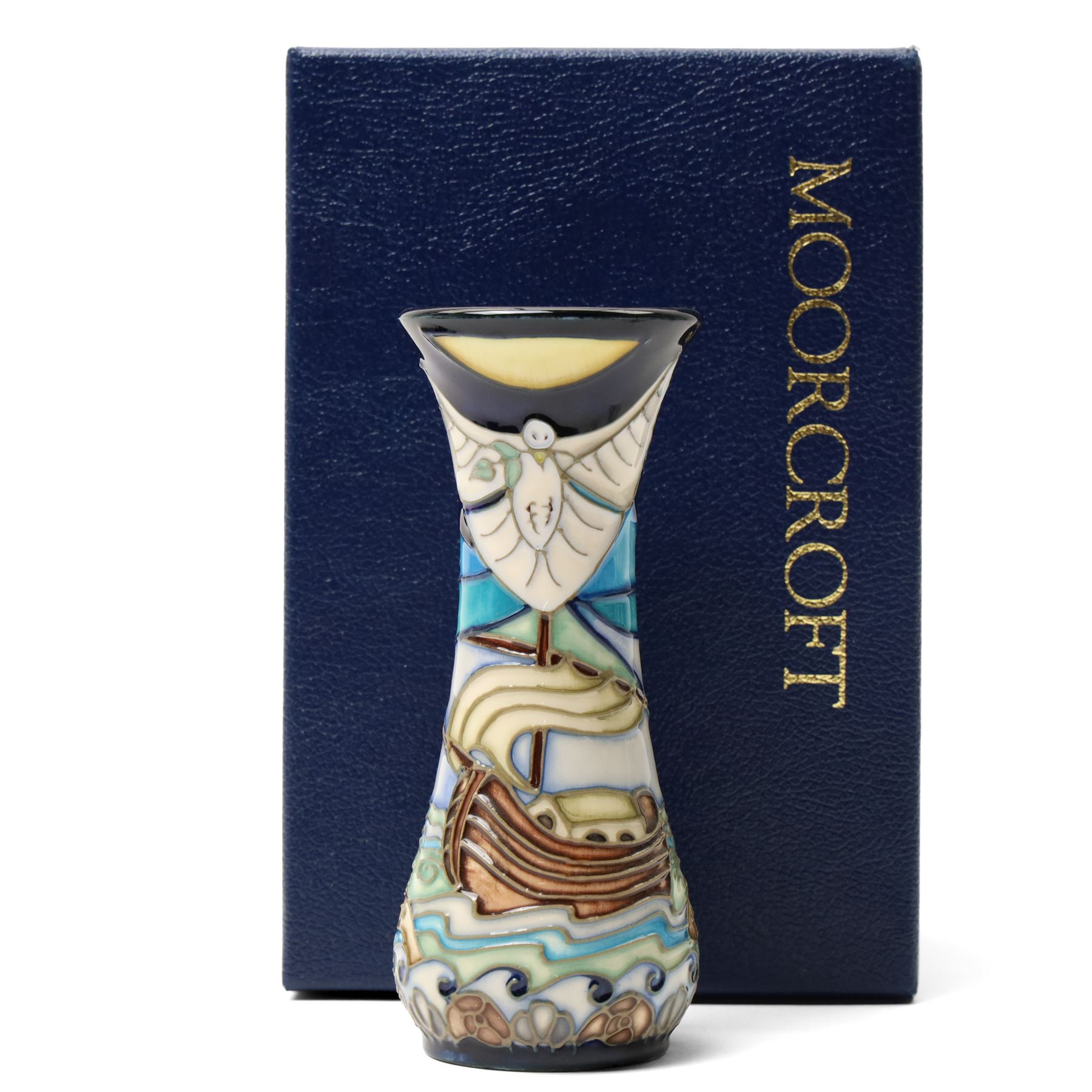 Moorcroft 'Wind of Change' pattern vase H13cm, boxed, Royal Crown Derby 'Striped Dolphin' limited edition paperweight 1166/1500, boxed and with certificate and another Dolphin paperweight, boxed and both with gold stoppers (3)  
