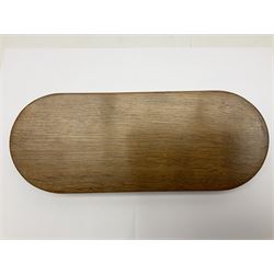Mouseman - oak pen tray, rectangular form with rounded ends, carved mouse signature over penny moulded edge, by the workshop of Robert Thompson, Kilburn