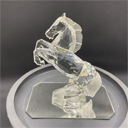 Five Swarovski Crystal figures, comprising giraffe, deer, hummingbird, rose and rearing horse, all with original boxes 
