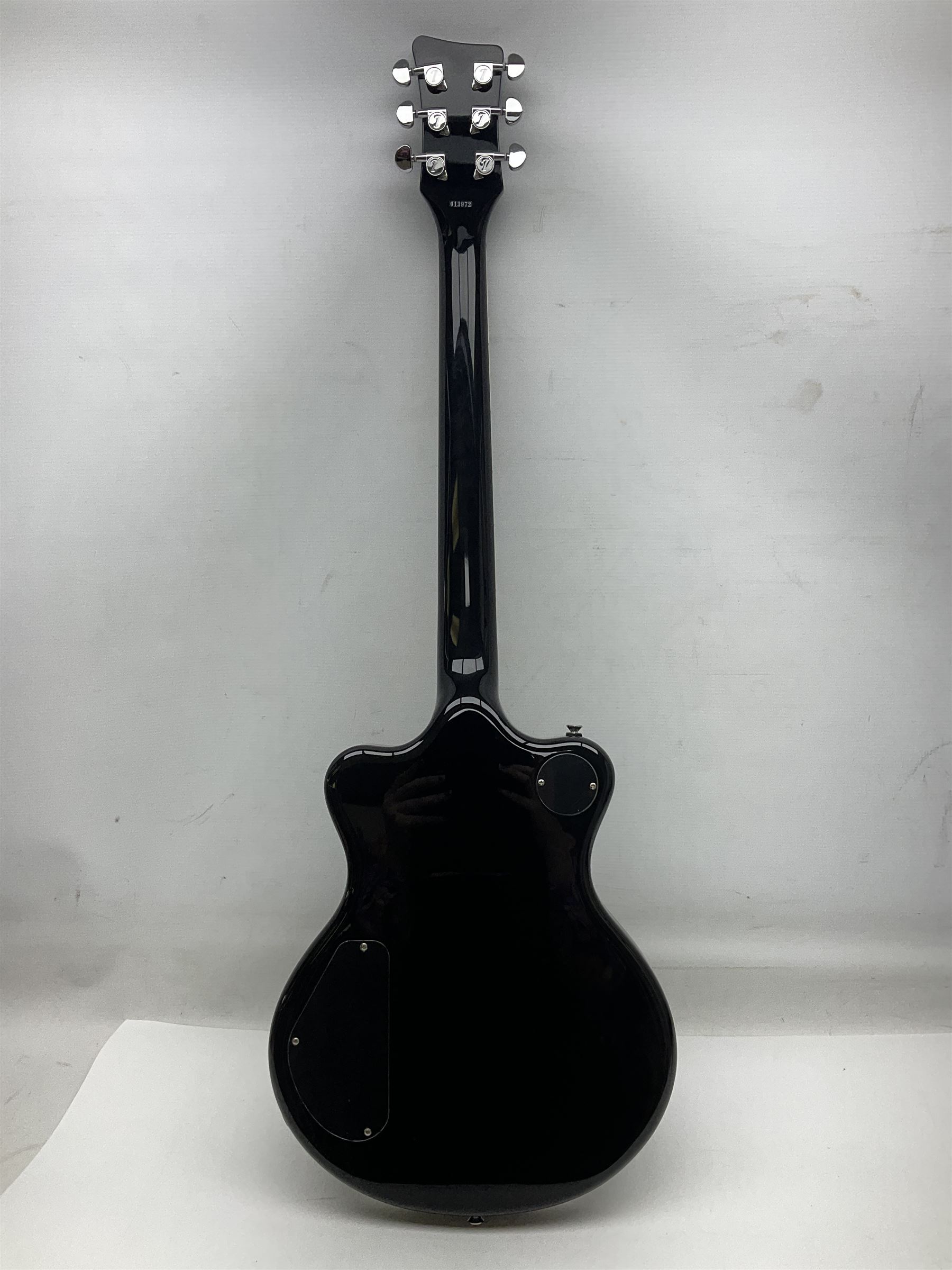 Italia Maranello Speedster electric guitar in black and white, serial no.013972; L99cm; in Italia soft carrying case; together with a boxed TGI 3491 guitar stand