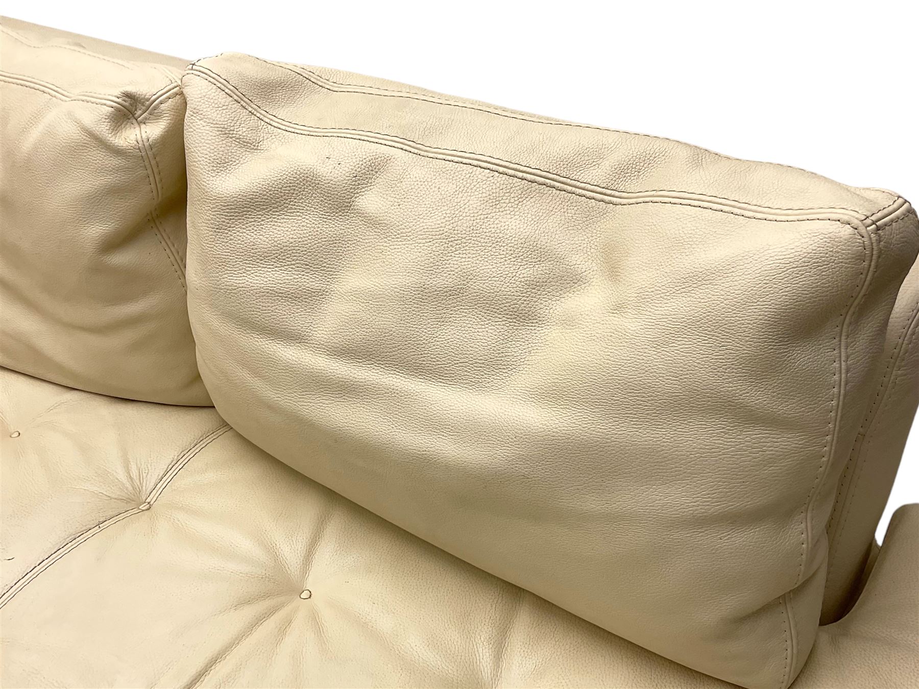 Roche-Bobois - large corner sofa, upholstered in ivory leather with buttoned seat cushions, raised on a stained beech base with bracket feet