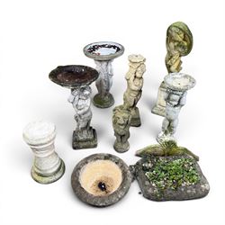 Collection of cast stone garden ornaments - three figure bird baths, figure on plinth, seated lion, lion, boy figure, and stone trough (9)
