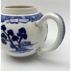 Chinese blue and white Kangxi porcelain teapot and cover, the body decorated with typical motifs including blossoming peonies, rockwork and pair of birds, the lobed cover with conforming decoration, including cover H15cm