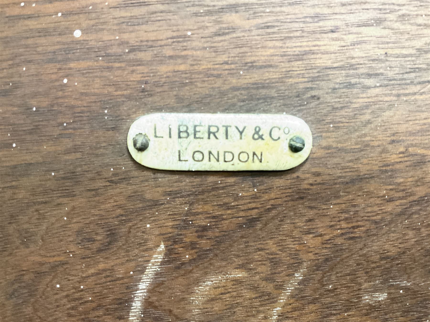 Liberty & Co circa 1890 - walnut centre table, hexagonal form, fretwork frieze, star stretcher base, turned supports on button feet. Stamped on underside.
Featured in - Pictorial Dictionary of British 19th century Furniture Design, Daryl Bennett Liberty's Furniture, 1875-1915, The Birth of Modern Design.
Liberty Style, The Classic Years, 1898 - 1910, by Mervin Levy.