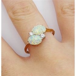 18ct gold two stone oval opal and two stone round brilliant cut diamond crossover ring, London 1981