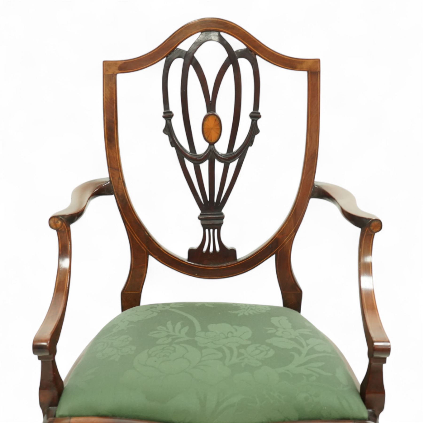 Hepplewhite design mahogany set of ten dining chairs, two carvers and eight dining chairs, with inlaid oval medallion to the vase splat, green upholstered drop-in seats, on square section tapering supports with spade feet, including two carvers