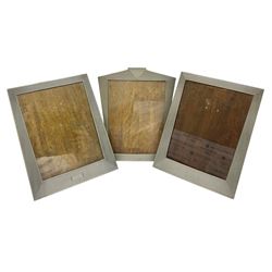 Three Art Deco pewter photograph frames, each with wooden easel supports, stamped Framecraft verso, tallest H25cm