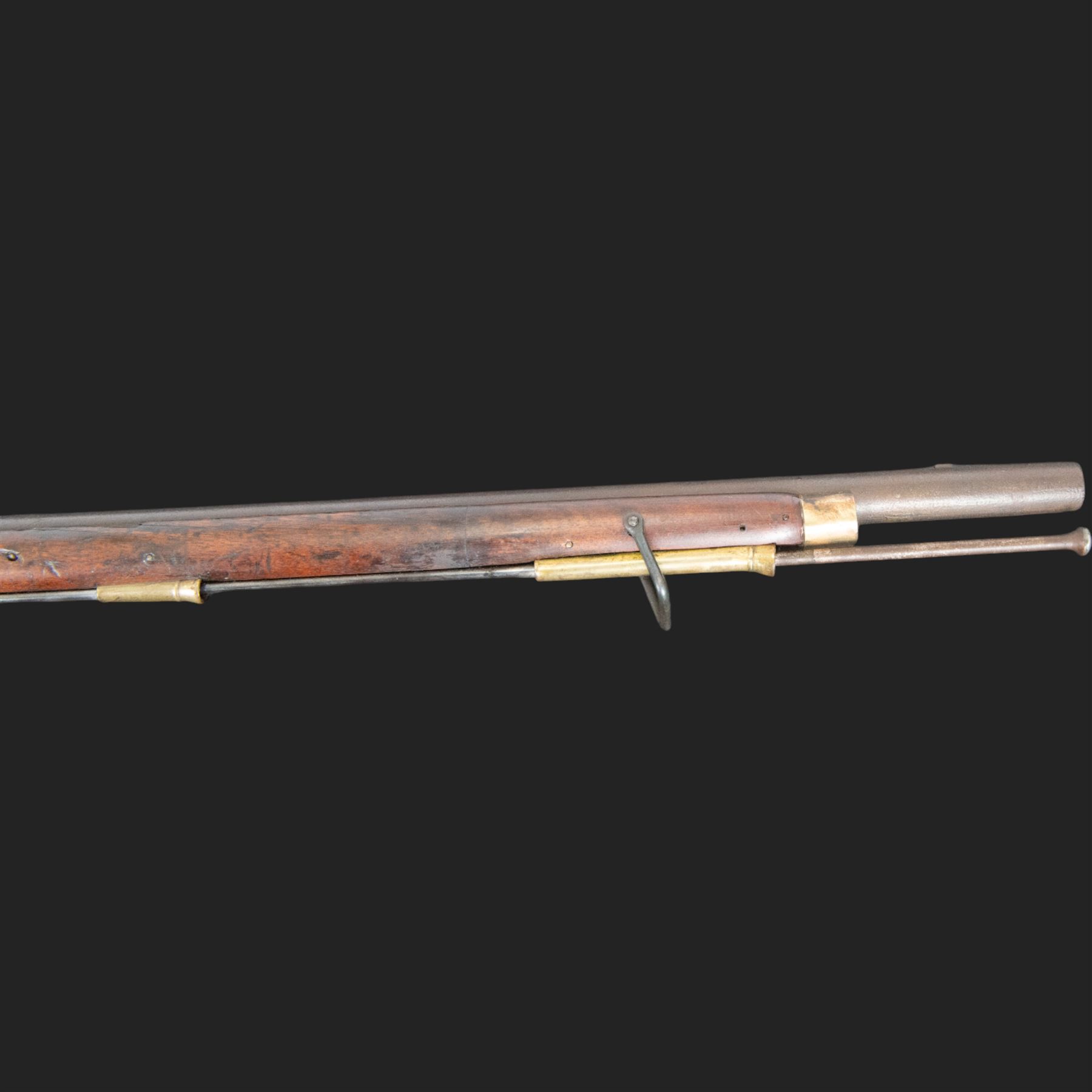 Brown Bess flintlock musket, 37in barrel, action marked with crowned GR and Tower, with brass mounts, the thinned butt marked 38, sling swivels, steel ramrod, overall L132cm
