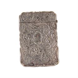 Victorian silver castle-top card case, of rectangular form with scrolling sides, relief embossed with the St Paul's Cathedral and surrounded by foliate scrolls, with vacant cartouche to reverse, hallmarked Nathaniel Mills, Birmingham, probably 1847, H8.5cm W6cm
