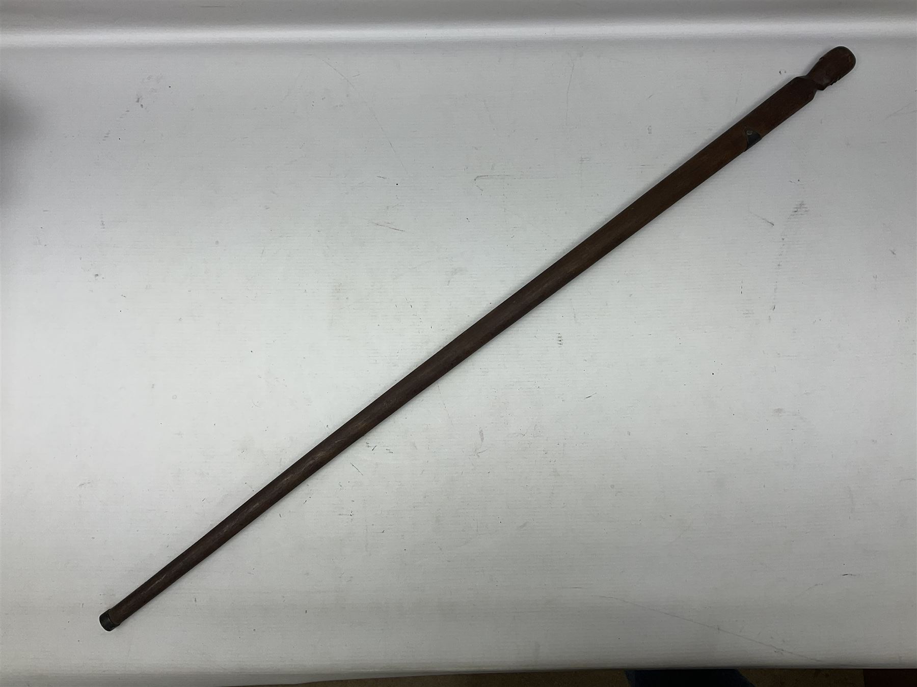 WW1 Prisoner of War carved beech walking cane, the terminal as a head wearing a helmet, and inscribed 'Souvenir from 370th PoW Coy Menin 1919'; bears metal plaque with indistinct monogram L91cm