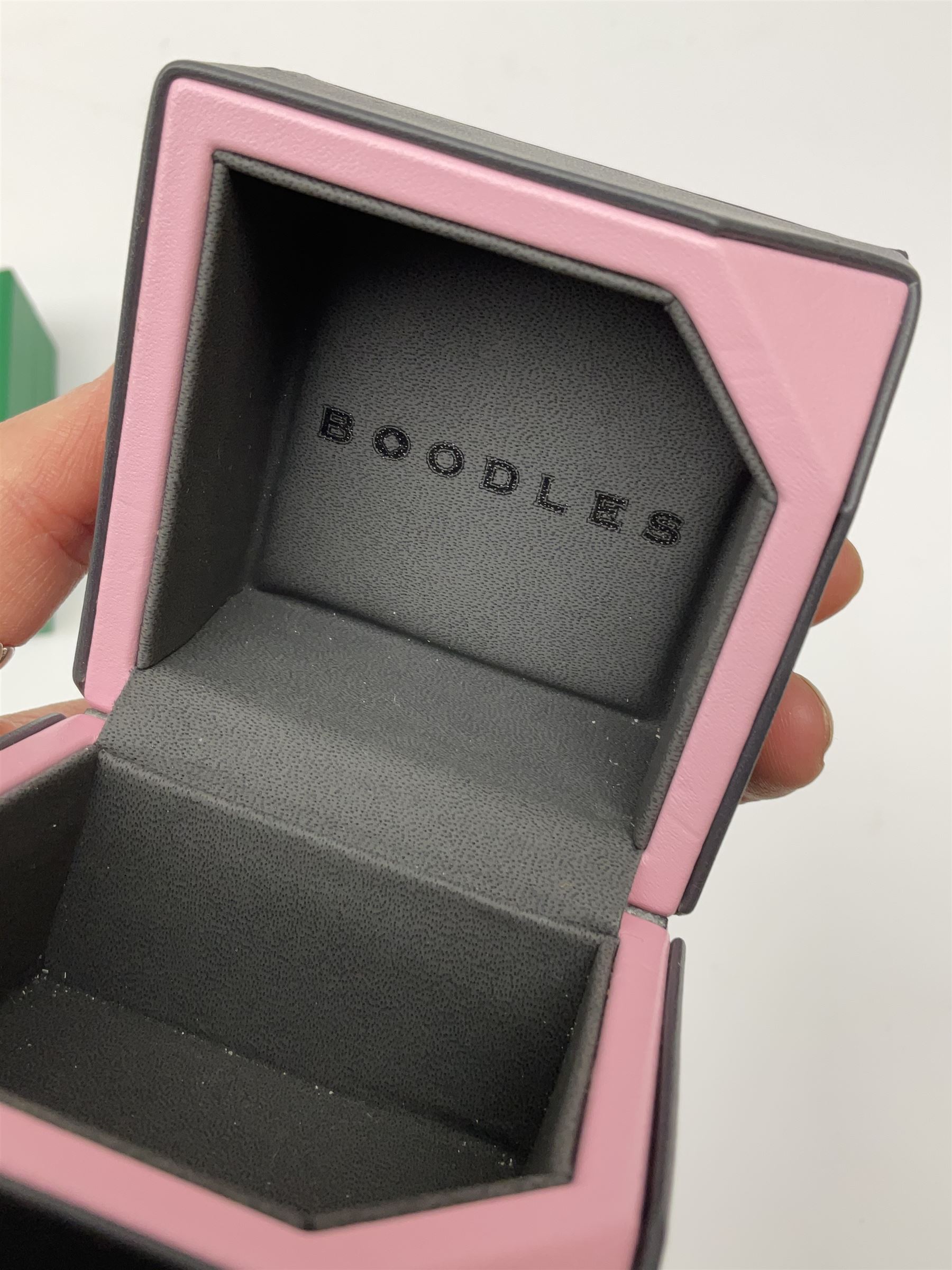 Collection of jewellery boxes including a vintage Boodle & Dunthorne bracelet box, two modern Boodles boxes, two Cartier Santos 701 sunglasses cases, one other Cartier box, Harrods cufflink/ring box and a Penlington & Batty necklace box (8)