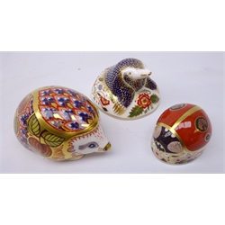  Three Royal Crown Derby paperweights: Mole designed exclusively for the Royal Crown Derby Collectors Guild dated 1994, gold stopper, Ladybird, silver stopper and Orchard Hedgehog  designed exclusively for the Royal Crown Derby Collectors Guild dated 1999, gold stopper (3)  
