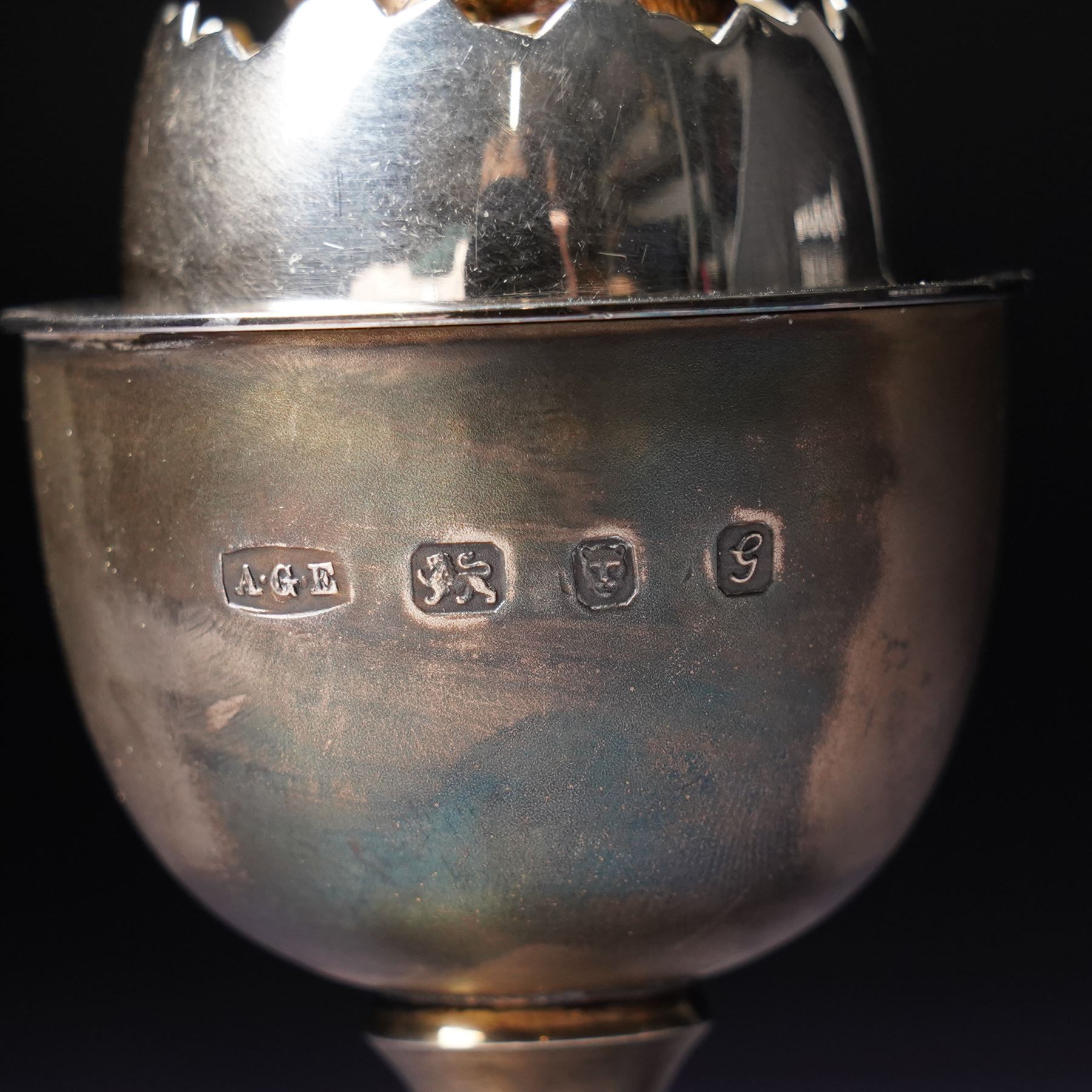 Anthony Gordon Elson -  Elizabeth II limited edition novelty silver and silver gilt surprise egg, the cup holding a gilt lined egg, bayonet opening to reveal two bunnies 4/200  H11cm London 1981