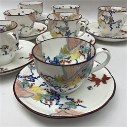 Mid 19th century English porcelain Kakiemon tea wares, decorated in the 'Flying fox' pattern after Meissen, with flying fox and squirrel amidst bamboo and blossoming and fruiting vines, comprising four larger teacups and four smaller, plus eight saucers, each with registration lozenge beneath, larger teacups H6.5cm, saucers D14.5cm