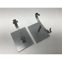 Pair of green agate slices, polished with rough edges raised upon silvered metal stands, H19cm