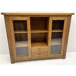 G-Plan medium oak display cabinet, two glazed doors flanking single shelf and two drawers, stile supports 