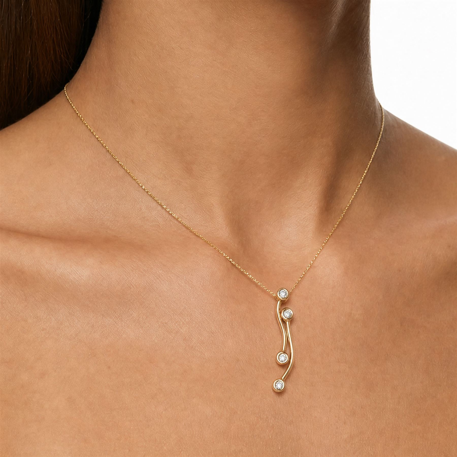 18ct gold pendant necklace, the pendant bezel set with four round brilliant cut diamonds, on a box link chain necklace, stamped 750, total diamond weight approx 0.15 carat