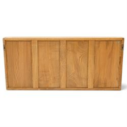 Ercol - elm plate rack, rectangular form with rounded corners, fitted with two open shelves divided by staggered upright partitions, fixings for hanging