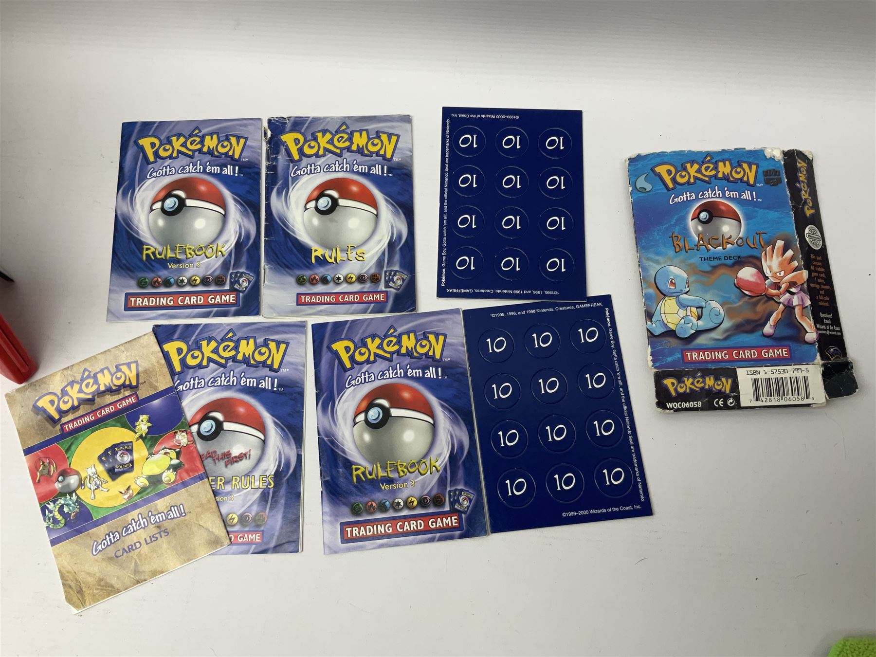 Collection of Pokemon trading cards, mostly 1999 Wizards Pokemon cards to include holo Charizard 4/102, first edition holo Machamp 8/102, further holographic cards; Dark Flareon 35/82 and Dark Vaporeon 45/82, cards from themed sets and 4th edition prints; 1998 Electronic Pokédex with cardboard boxes for themed decks Blackout, Overgrowth and Power Reserve Jungle, along with a large quantity of energy and trainer cards 
