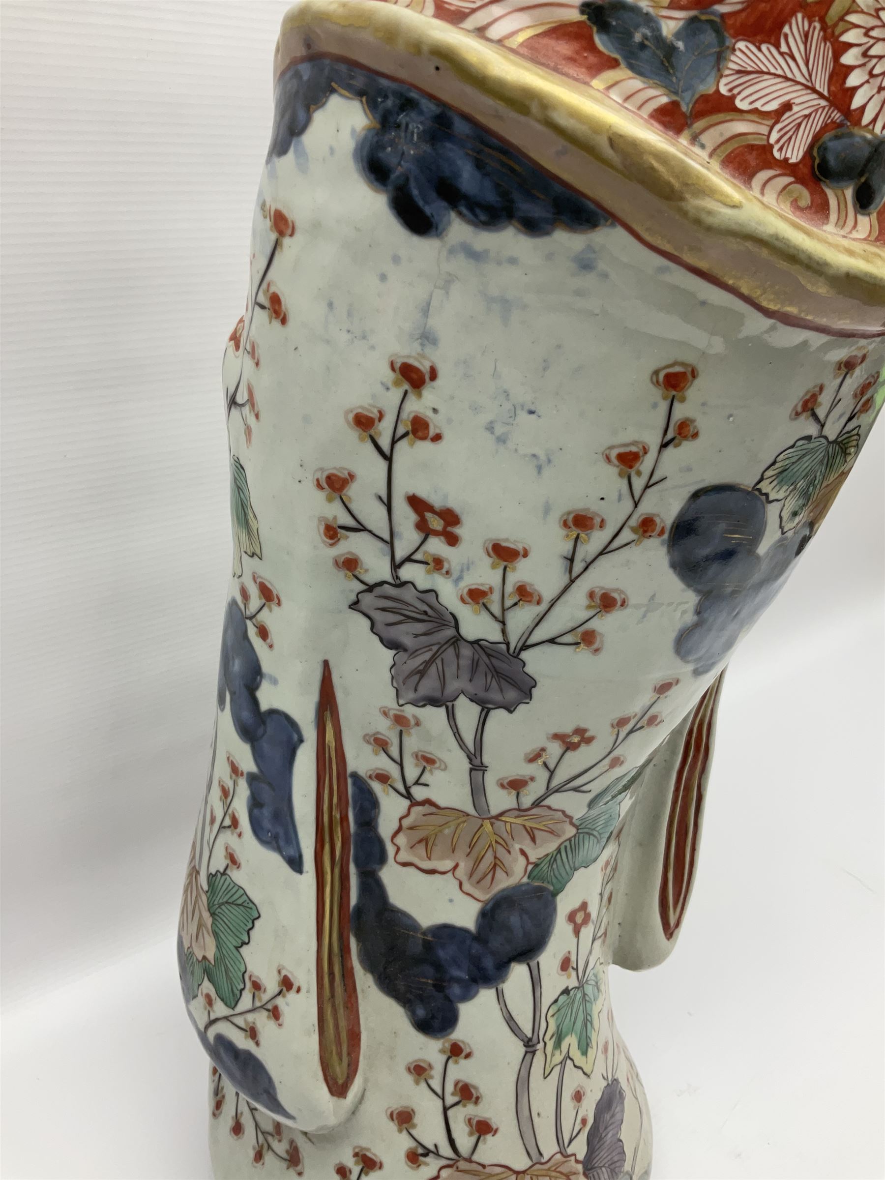 Large Japanese Imari porcelain figure, modelled as a Bijin, wearing a long kimono decorated with apple blossom and leafy branches on a white ground, with gilt detailing, possibly Edo period, H63cm