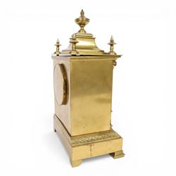 French gilt-bronze and porcelain mantel clock, architectural case surmounted by a stepped pediment with central urn finial and four subsidiary finials above two fluted Corinthian-style pilasters, the entire front inset with shaped porcelain panel incorporating a circular dial and numerals decorated with birds among flowering branches and two winding apertures and pierced brass hands, above a leaf and scroll cast frieze, raised on bracket feet, with an eight-day movement stamped 'AD MOUGIN Deux Medailles' striking the hours and half-hours on a coiled gong, with pendulum, circa 1900