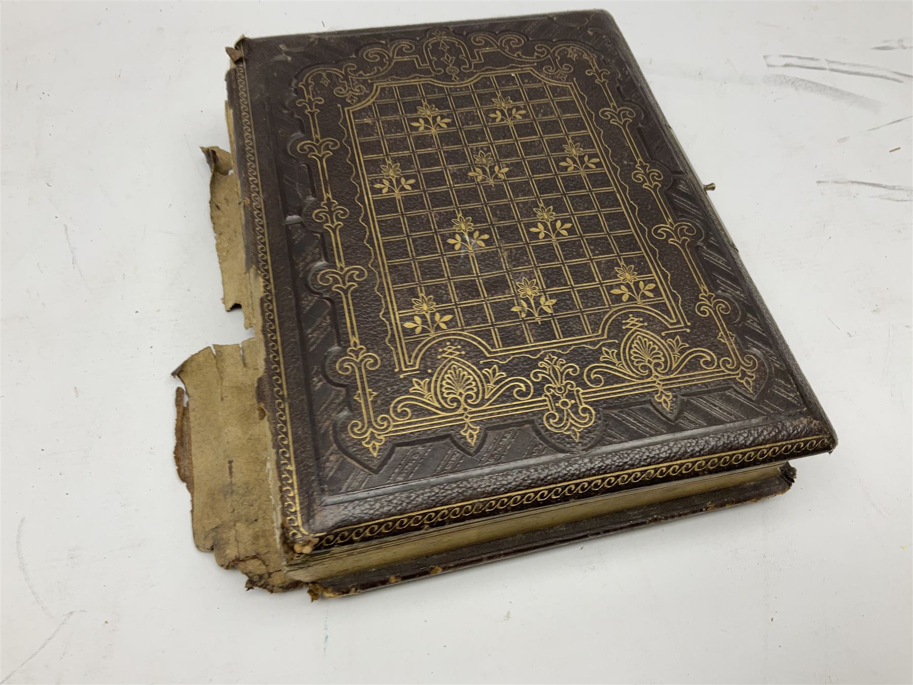 Victorian leather bound musical photo album, together with another victorian photo album, with photographs 