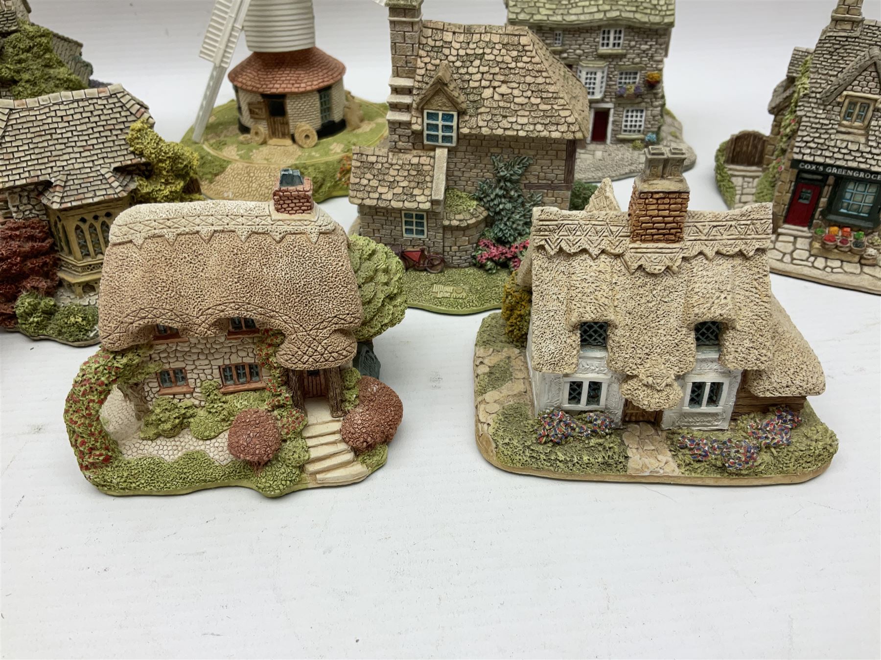 Twenty Lilliput Lanes, including The Chocolate House, Chiltern Mill, Blaise Hamlet, St Kevin Church, some with deeds and original boxes