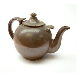A large 19th century salt glazed teapot, H26cm L36.5cm. 