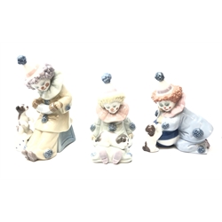 Three Lladro Clown/ Pierrot figures with Puppies, model numbers 5278, 5277 & 5279  