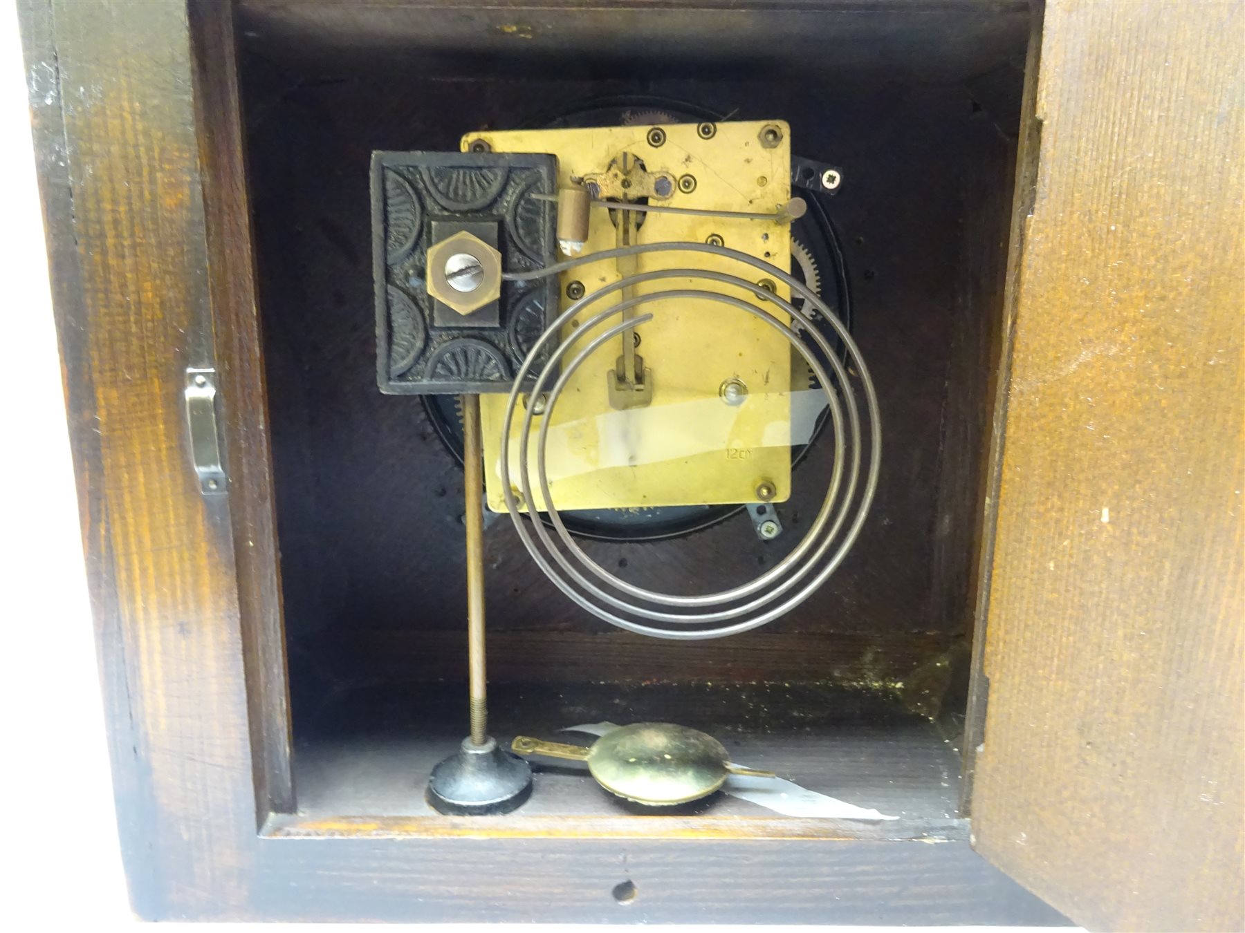 Smith Enfield mantel clock in arched oak case, silvered Arabic chapter