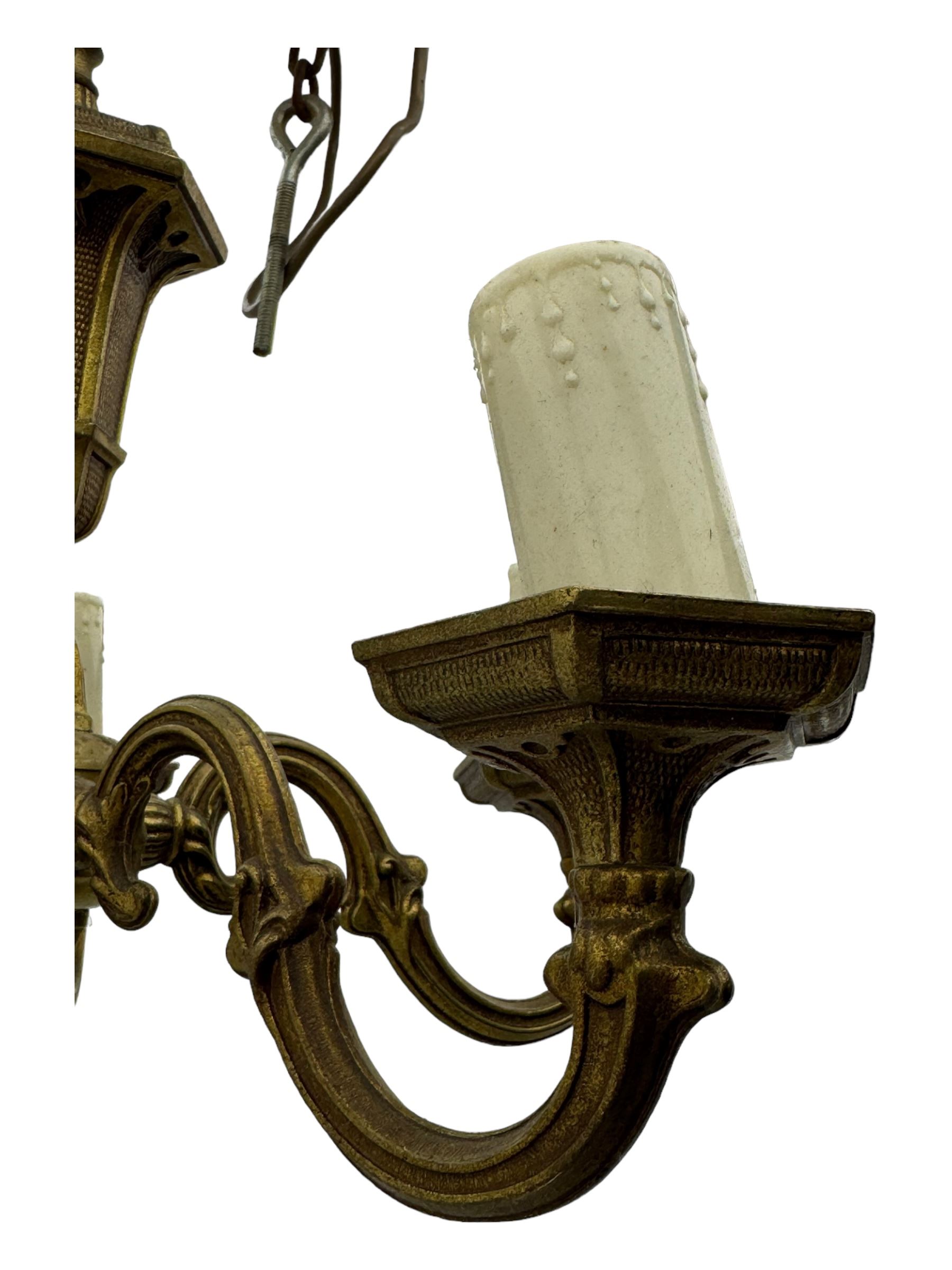 Collection of vintage and modern light fixtures, including copper pendant light, brass five-arm chandelier, hanging lantern and two small chandeliers with hanging faceted droplets (6)