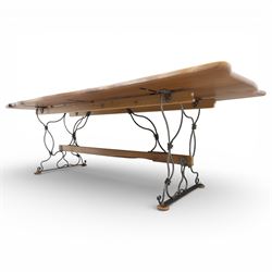 Paul Hodgkiss Designs of Glasgow - contemporary shaped elm dining table with wrought iron base; with set ten (8+2) matching high-back dining chairs, table of organic form above an elaborate wrought iron supports, with central elm stretcher, the chairs with en suite with matching wrought iron work burred elm headrest, purple velour upholstery with drop in seat     

Table: W 102cm, L 243cm, H 74cm
Chairs: W 56cm, D 52cm, H 130cm