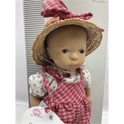 German Gotz articulated vinyl baby doll 'Claire' c1997 with original clothing, hat and labels; artist designed by Sylvia Natterer H35cm; boxed; and small child's wooden cased drum (2)