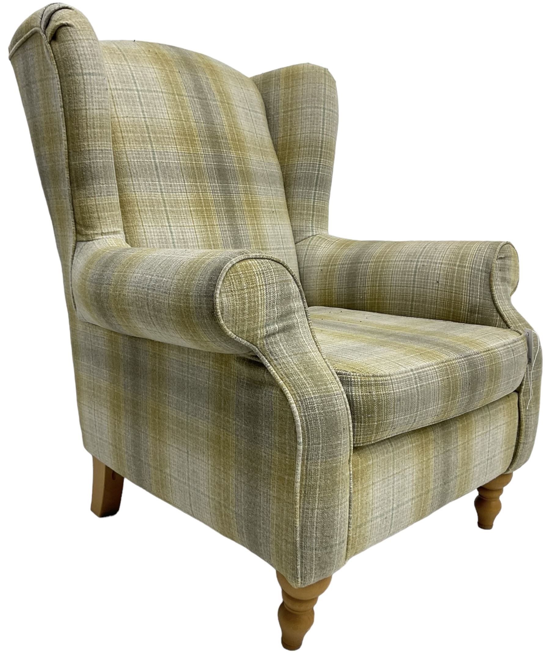 Next Home - 'Sherlock' hardwood framed wingback armchair, upholstered in pale green checkered fabric, on turned front feet