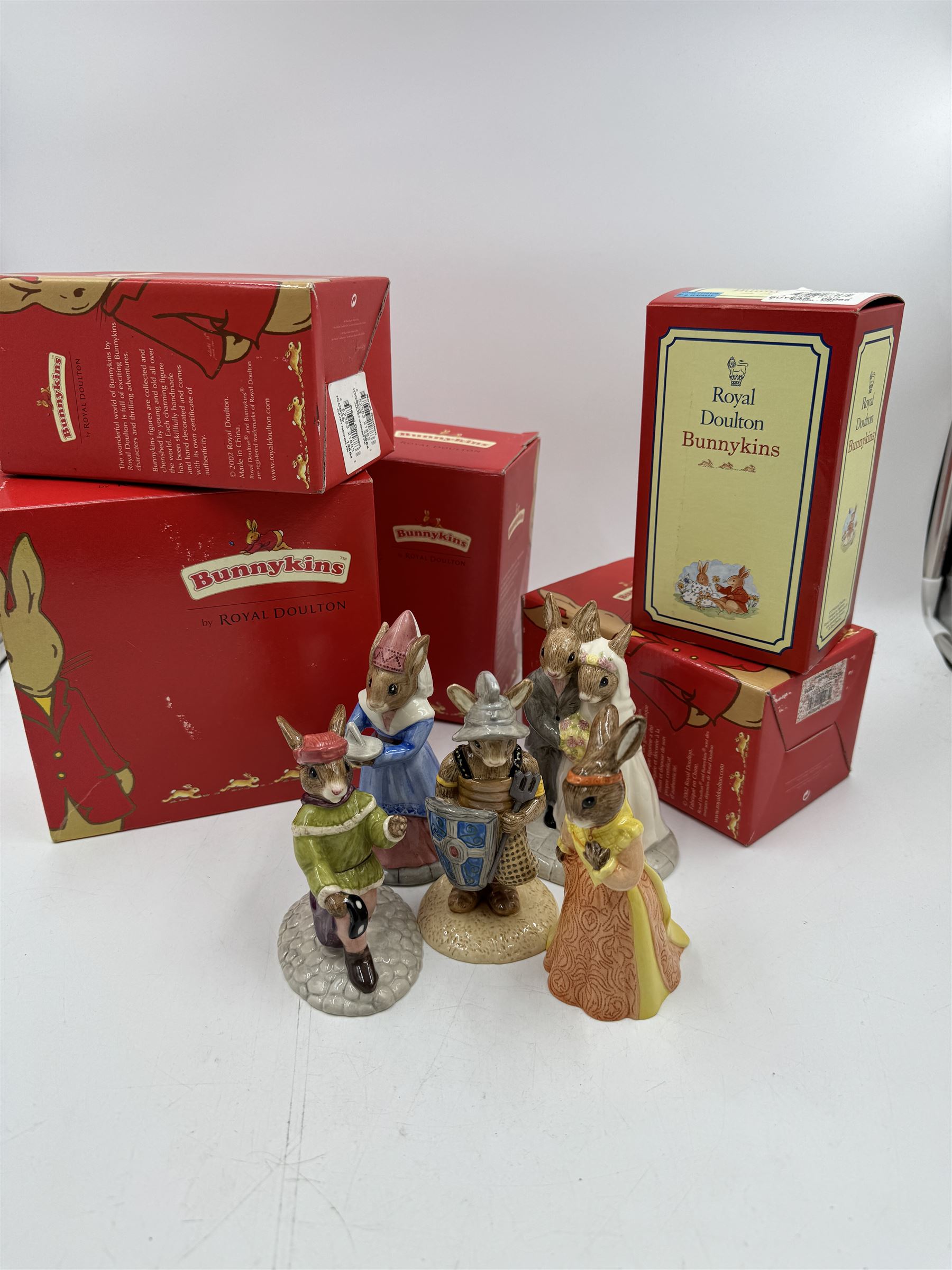 Five Royal Doulton Bunnykins comprising Sundial, Wedding Day, Gladiator, Romeo and Juliet 
