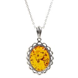 Silver Baltic amber oval pendant necklace, stamped 925 
