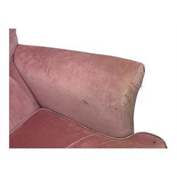 Paul Conti for G-Plan - 'Blofeld' Model 6250 swivel wingback armchair, upholstered in pink velour button back fabric, on teak base with castors